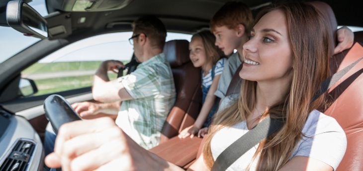 a group of people in a car